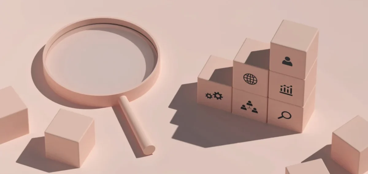 minimal pastel photo of a magnifying glass and soft blocks showing simple seo icons, explaining the building blocks of search engine optimization in a calm and beginner-friendly way