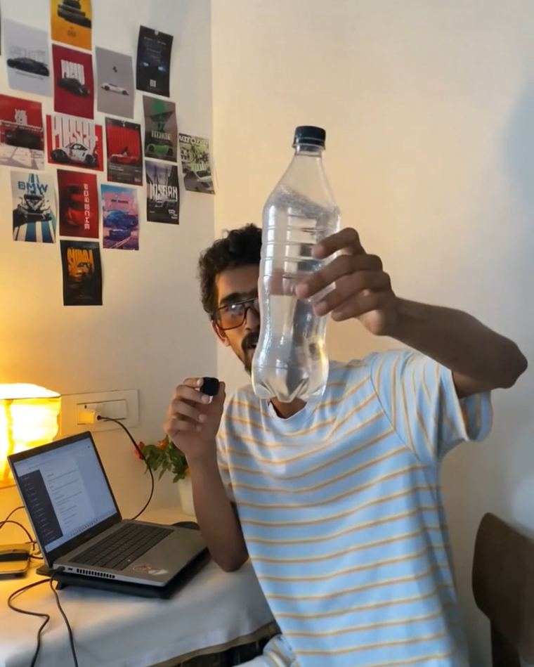 The same bottle now full of clear water after the Gemini AI transformation