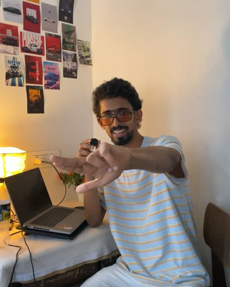 Gaznil making a finger-gun hand gesture before the AI gun effect